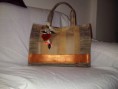 Cartera en tonos tierra. Bs.F 600
